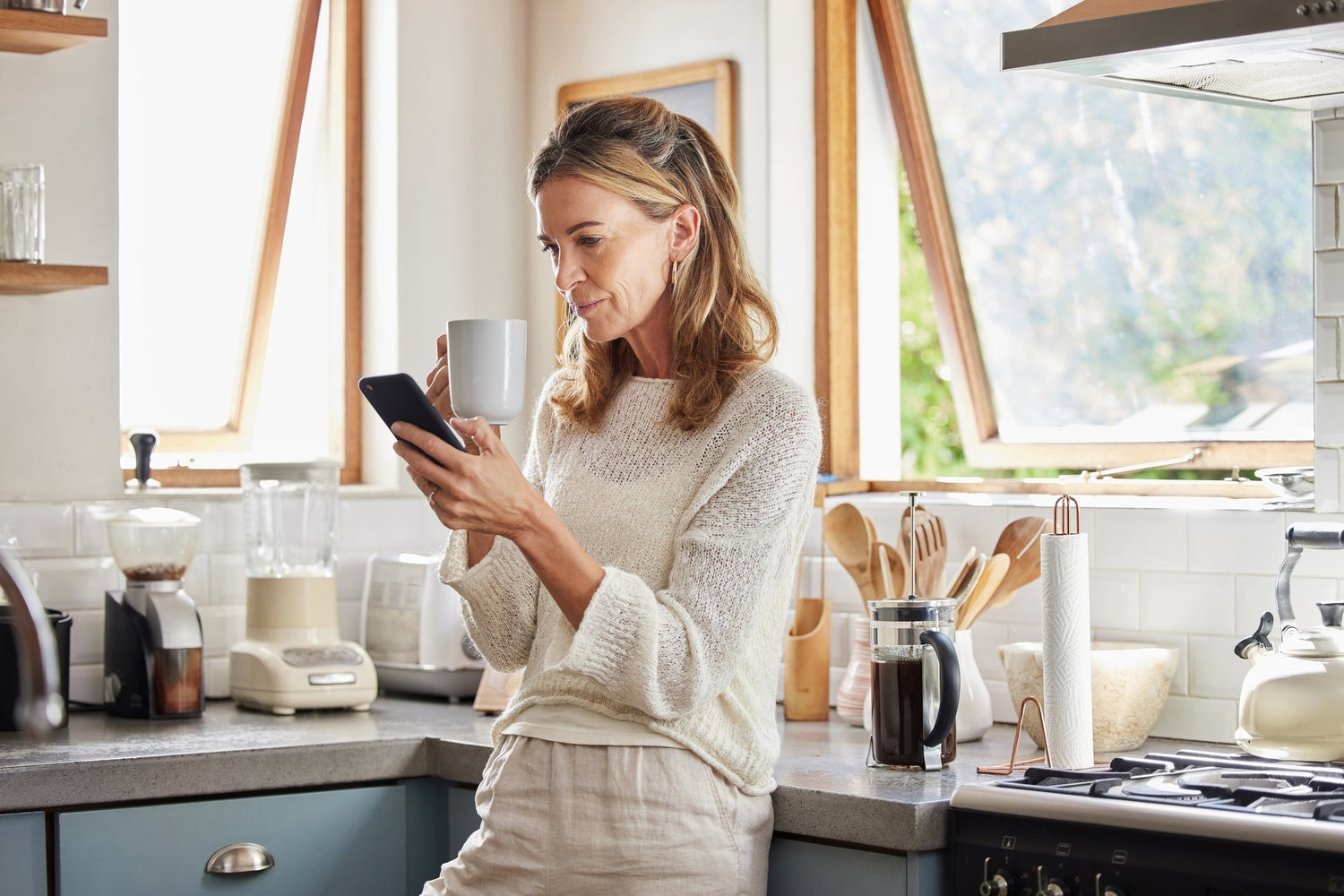 woman looking at her phone